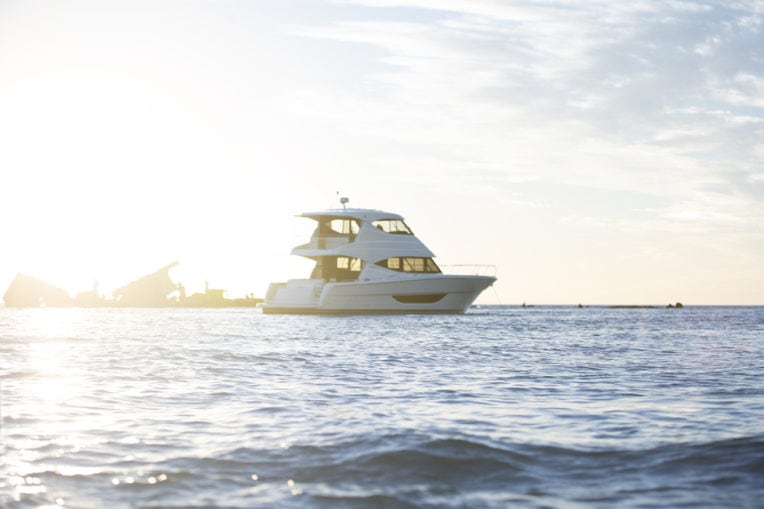Maritimo M51 anchored in the water at sunset