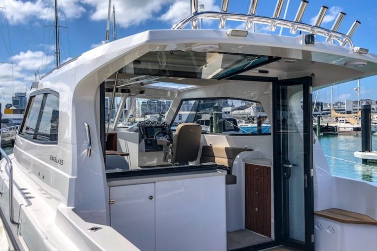Rayglass 3500 from the stern look through open windows and doors